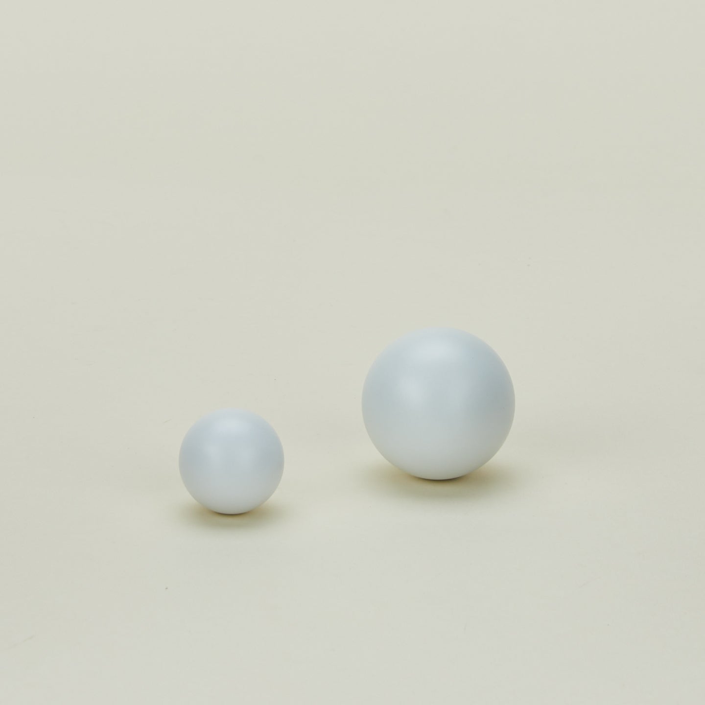 Essential knobs in white in large and small