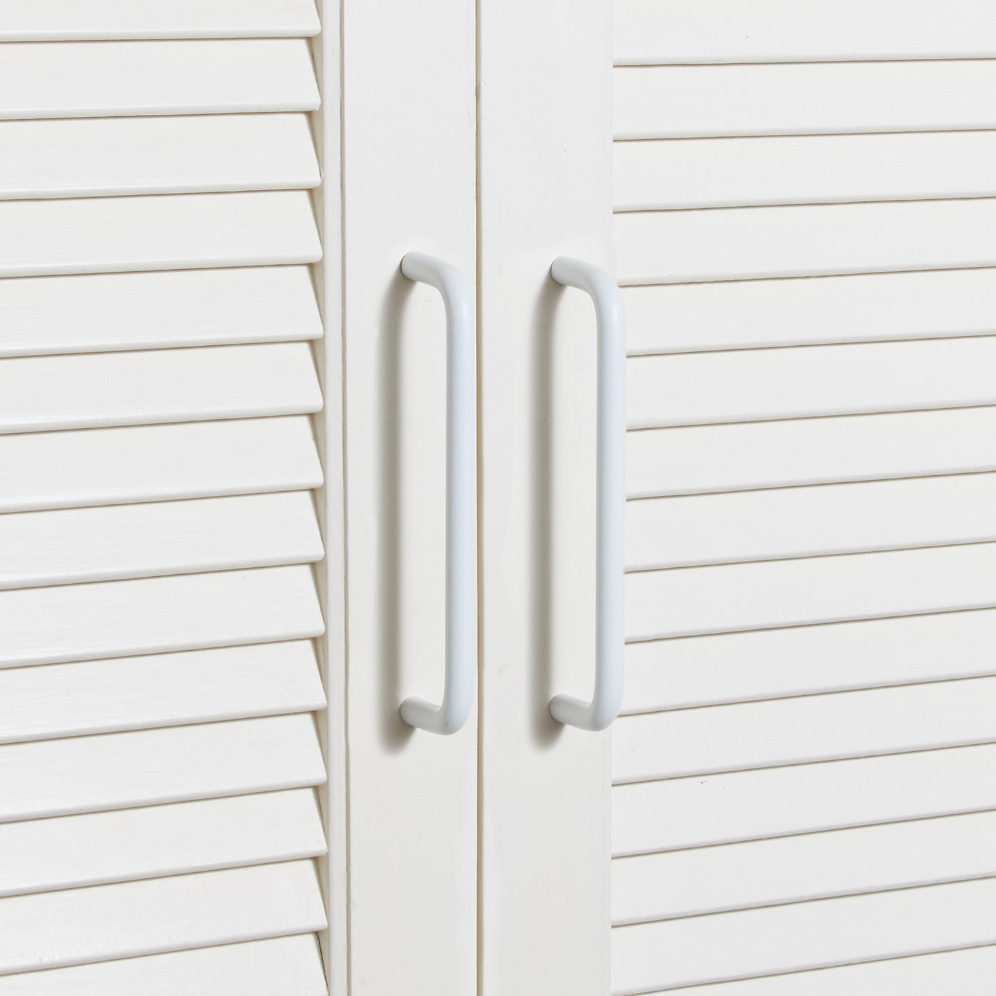 Large essential drawer pulls in white on cabinet