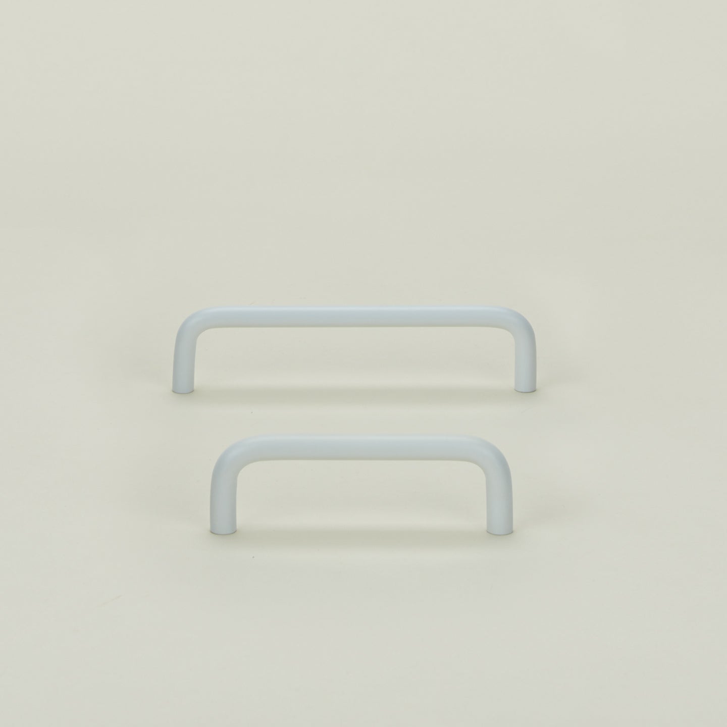 Essential drawer pulls in white in large and small sizes