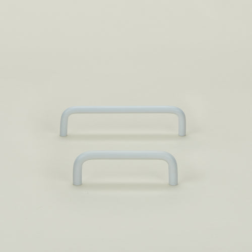 Essential drawer pulls in white in large and small sizes
