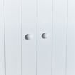 Small essential knobs in white on cabinets