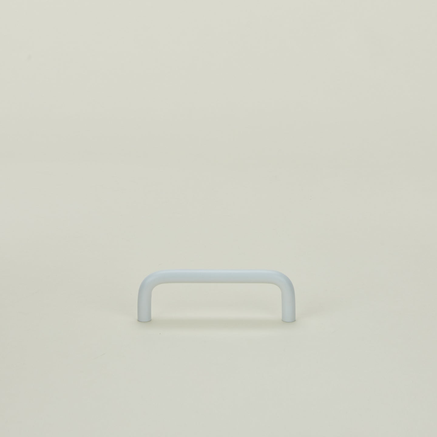 Small essential drawer pull in white