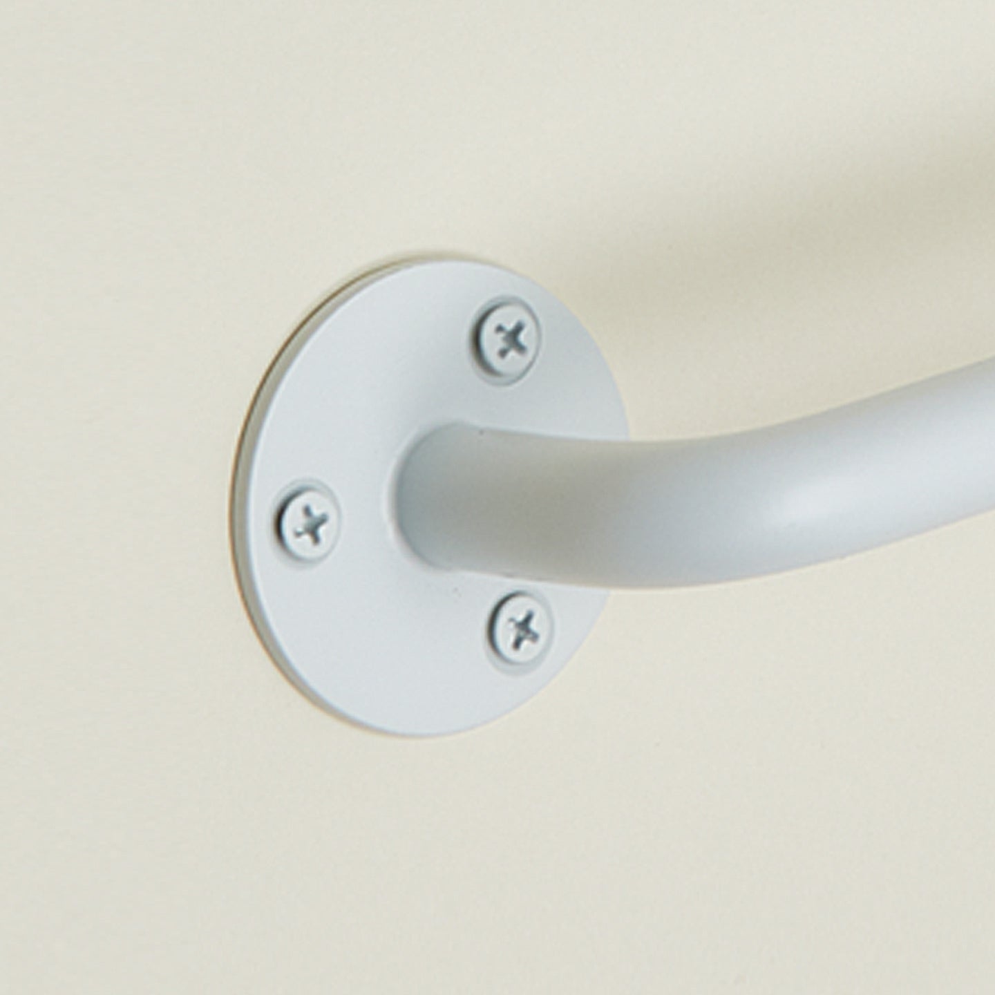 Close up view of essential towel bar in white