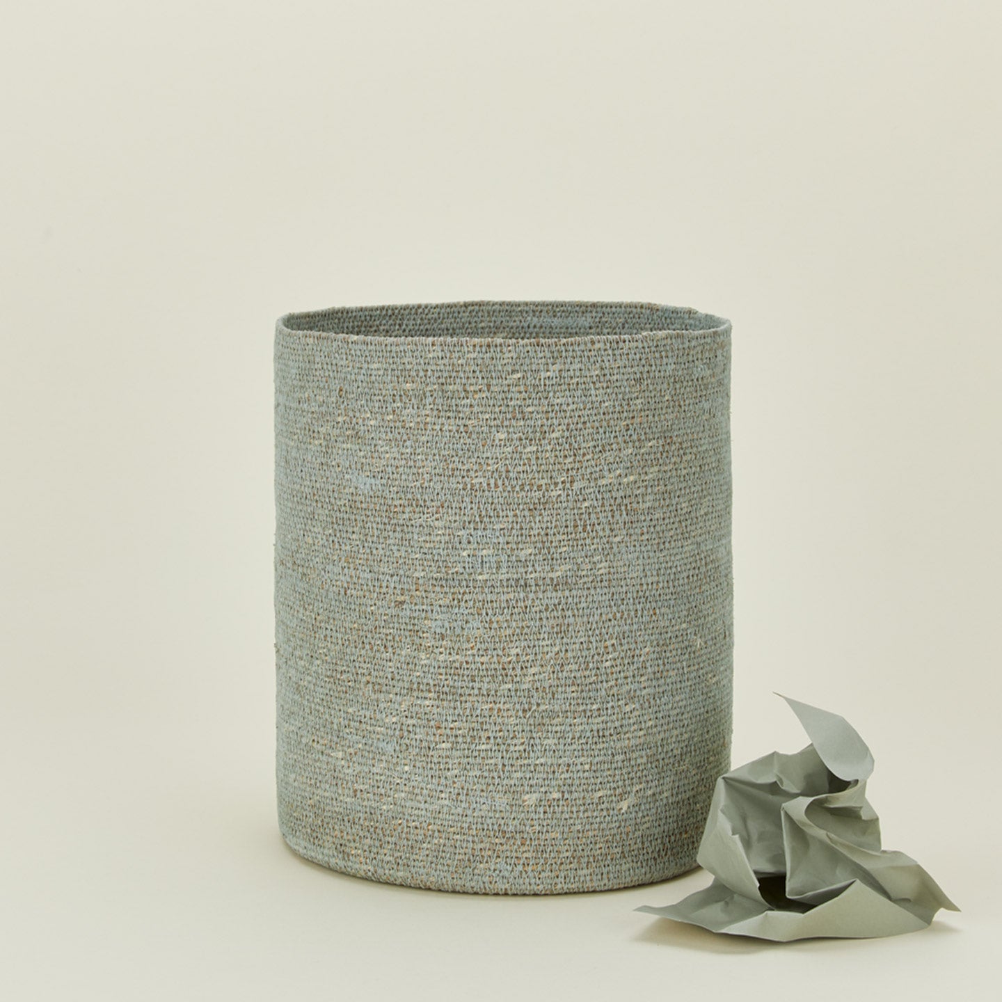 Essential woven wastebasket in sky