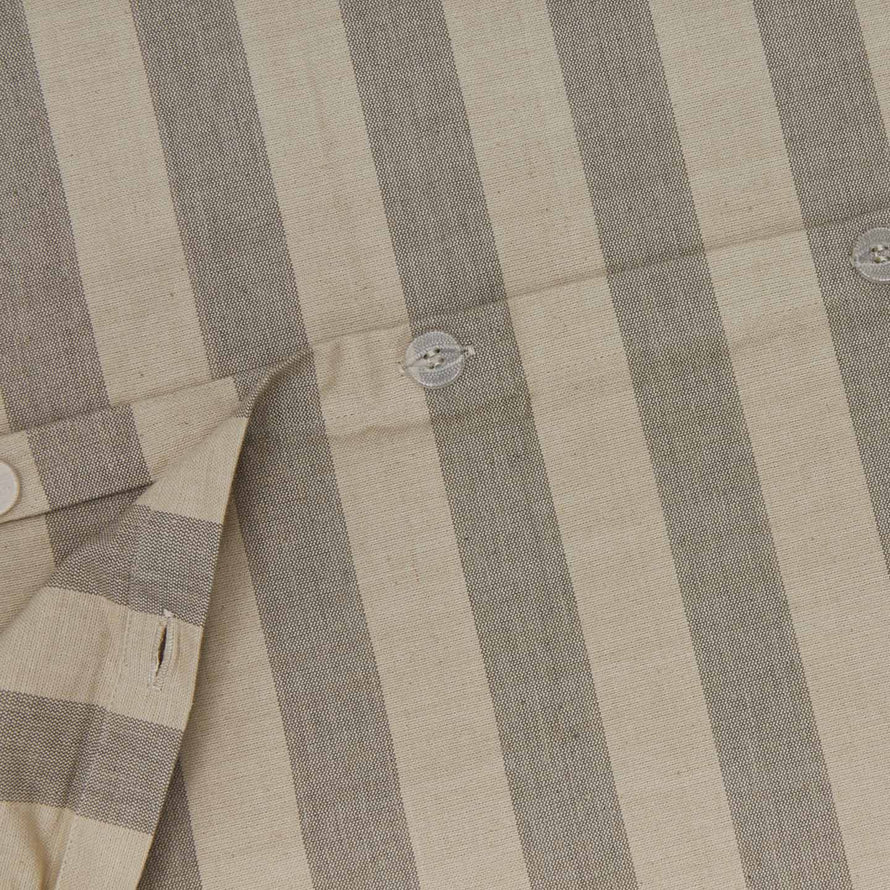 Close up view of essential striped duvet in light grey/dark grey