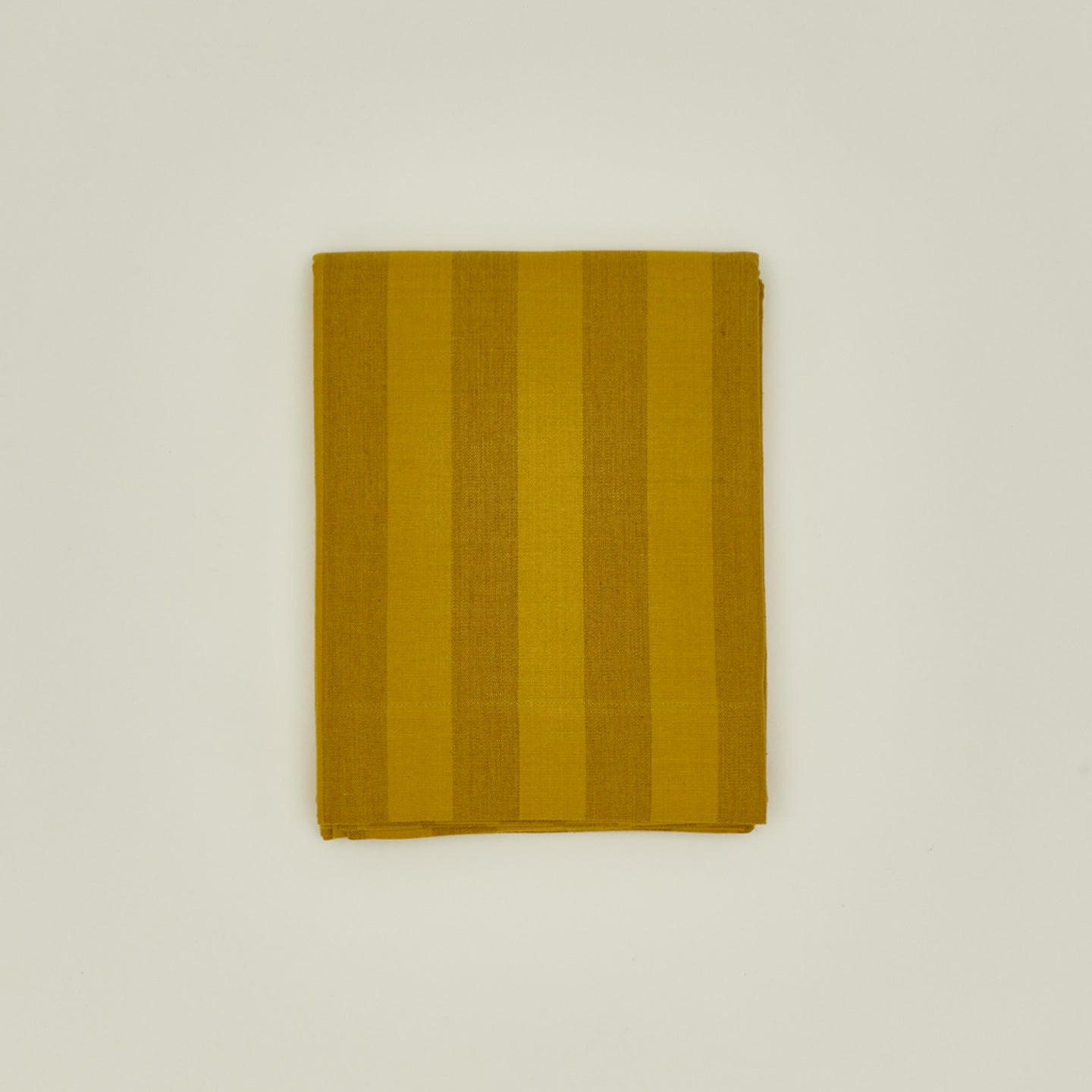 Essential striped shower curtain in mustard / bronze