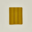 Essential striped shower curtain in mustard / bronze
