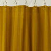 Essential striped shower curtain in mustard / bronze