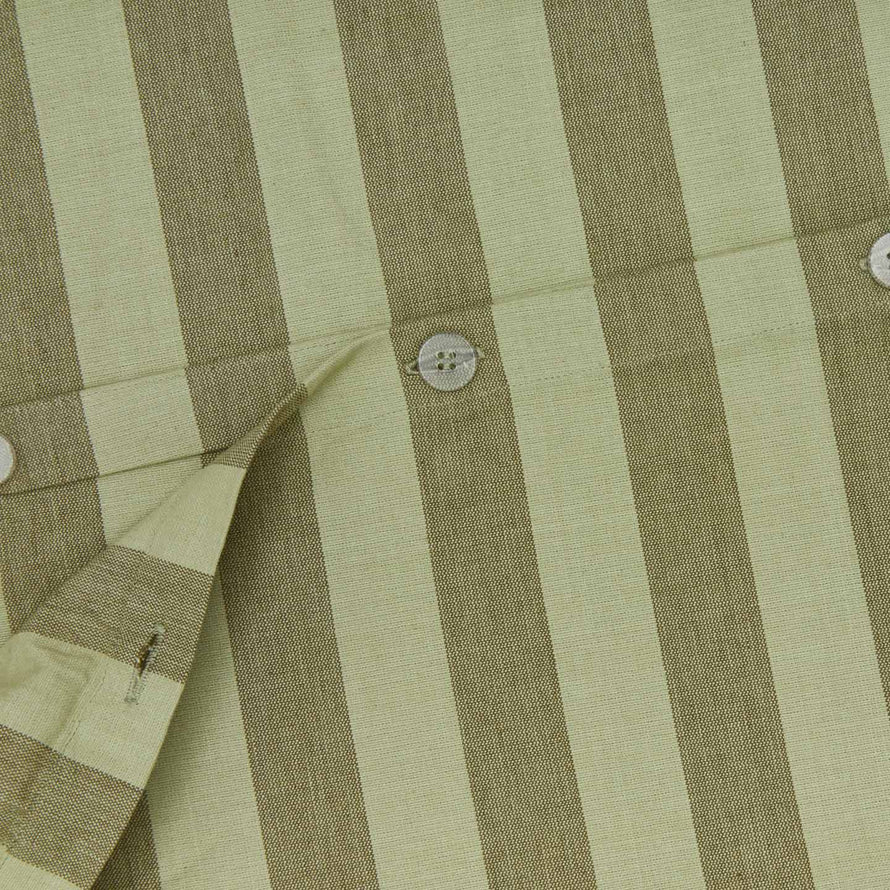 Close up view of essential striped duvet in sage/olive