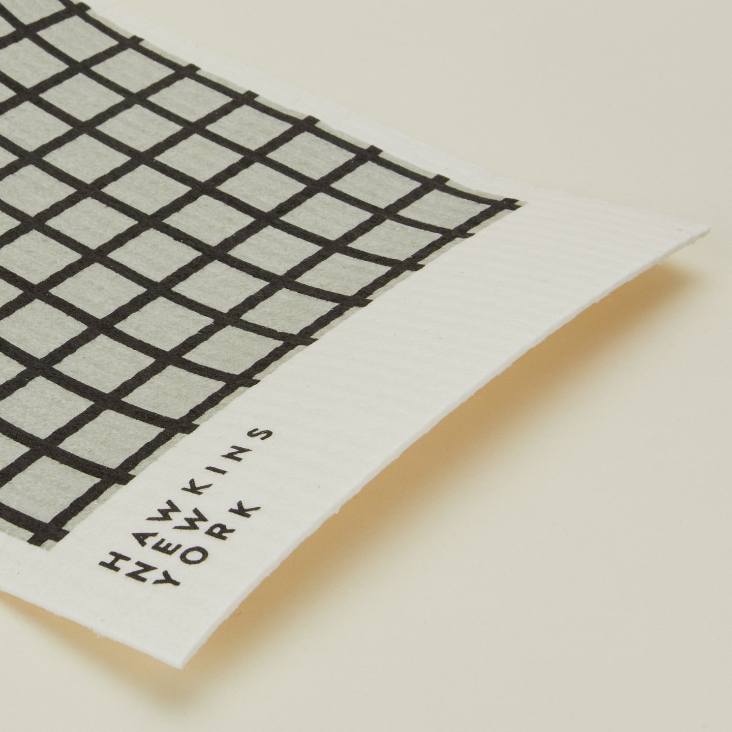 Close up view of essential swedish dishcloths in light grey/black