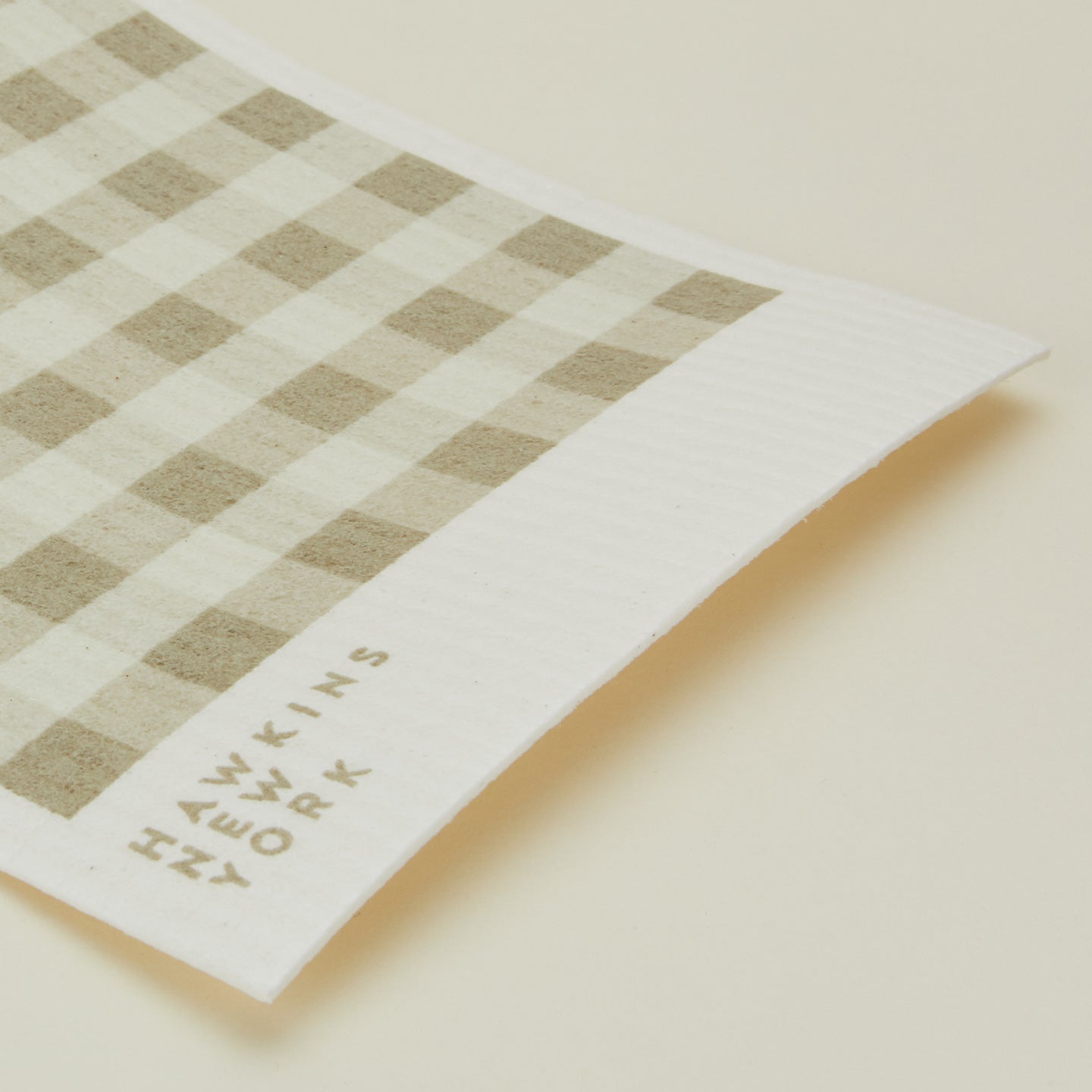 Close up view of essential swedish dishcloths in ivory/flax