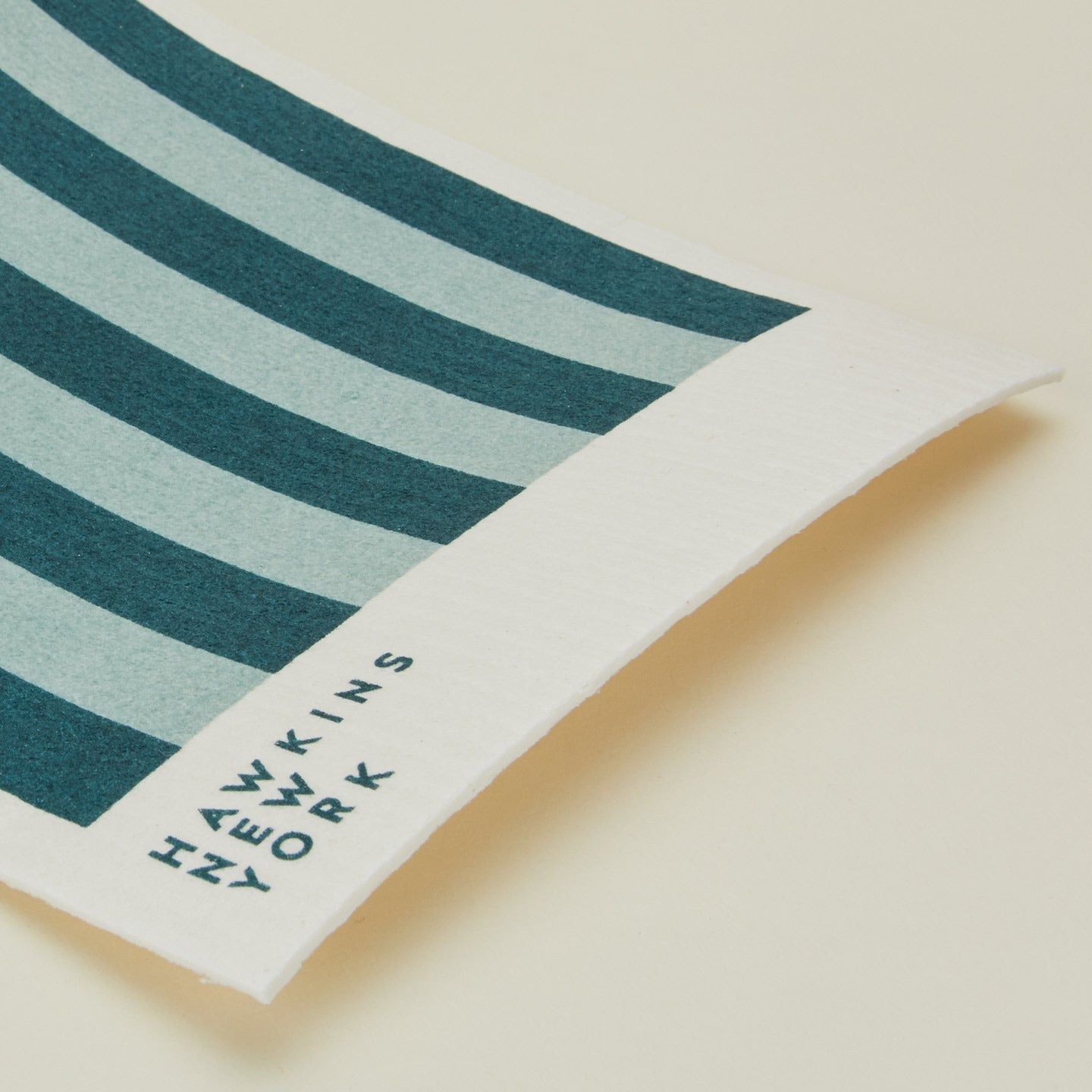 Close up view of essential swedish dishcloths in sky/peacock