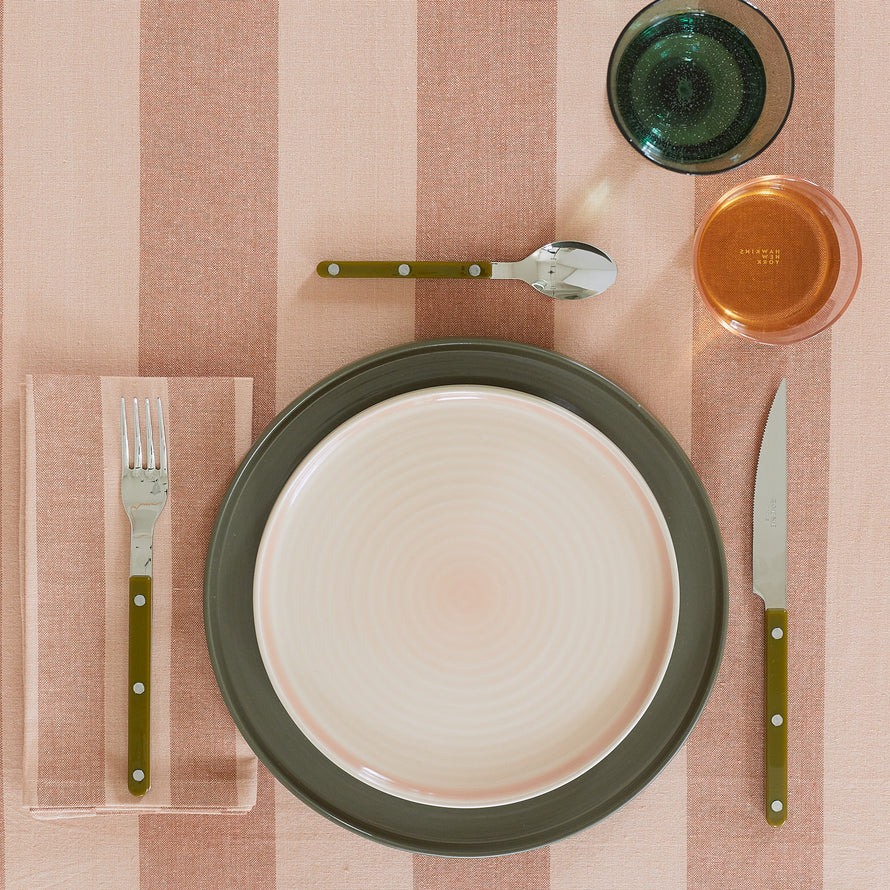 Placesetting on Essential Striped Tablecloth in Blush and Terracotta.