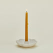 Floral Society Fleur Taper Holder with lit candle