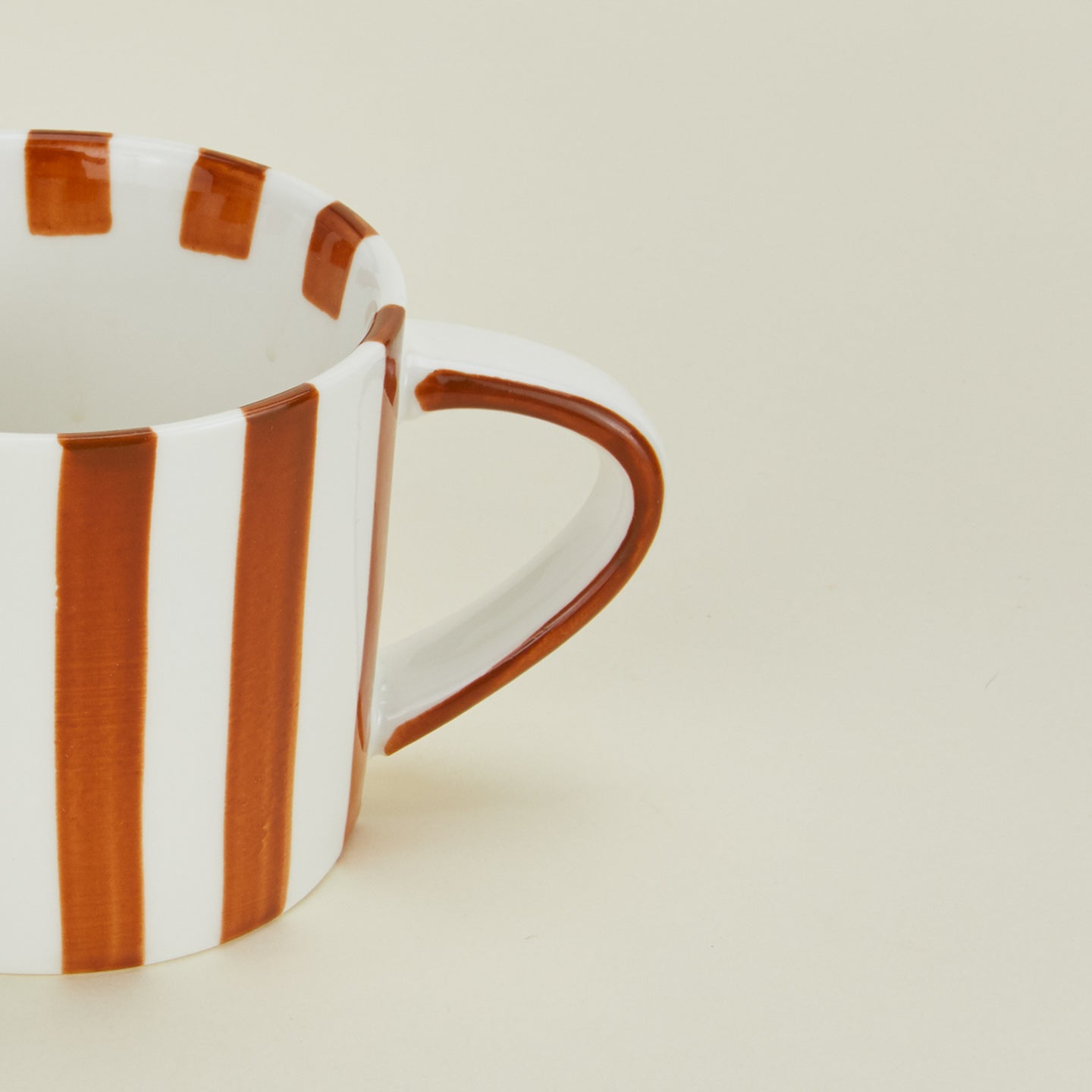 Close up view of Fodory brown striped mug
