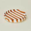Detailed view of Fodory brown striped salad plate