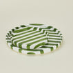 Close up view of Fodory olive striped plates