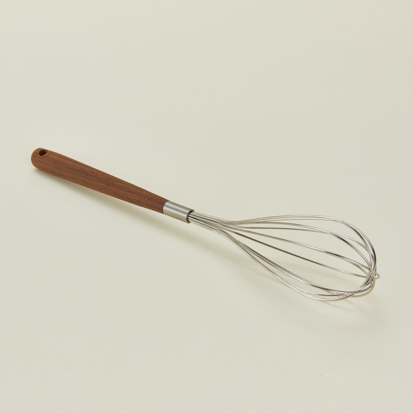 Detailed view of Fodory walnut handled whisk