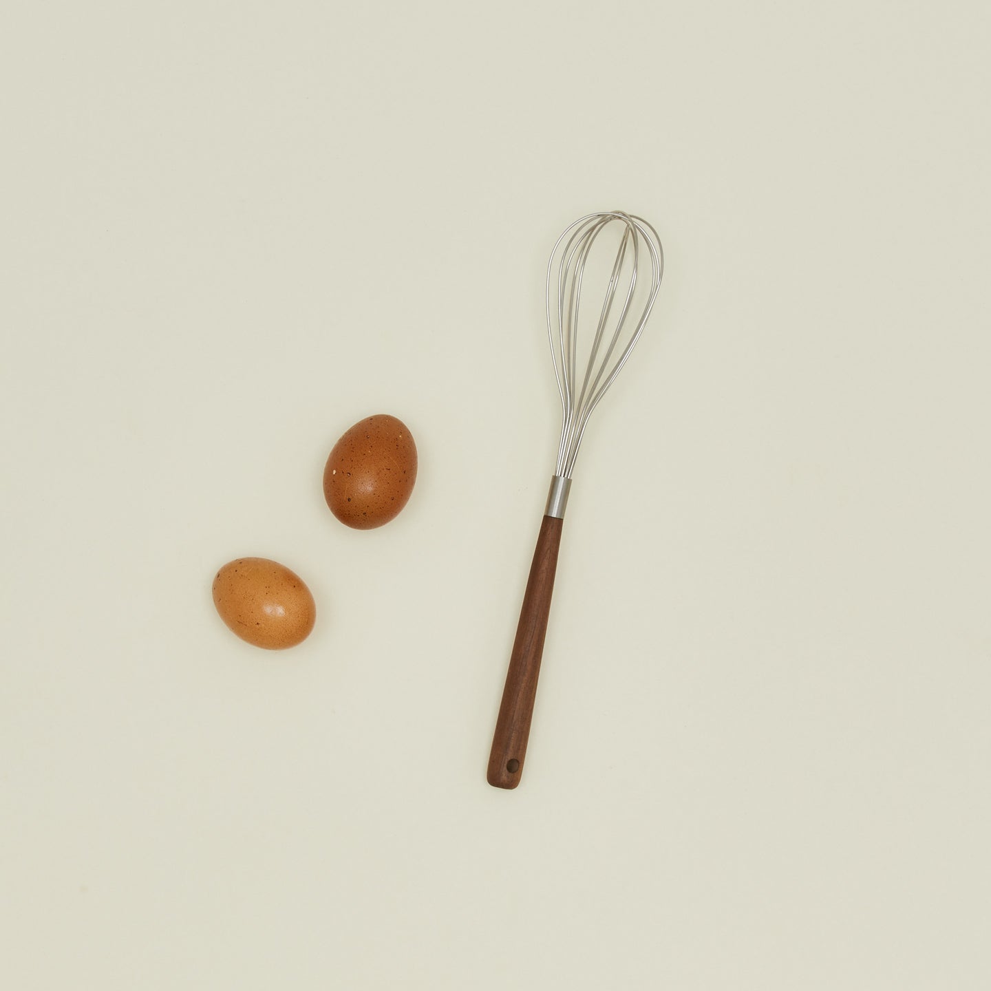 Fodory walnut handled whisk with eggs