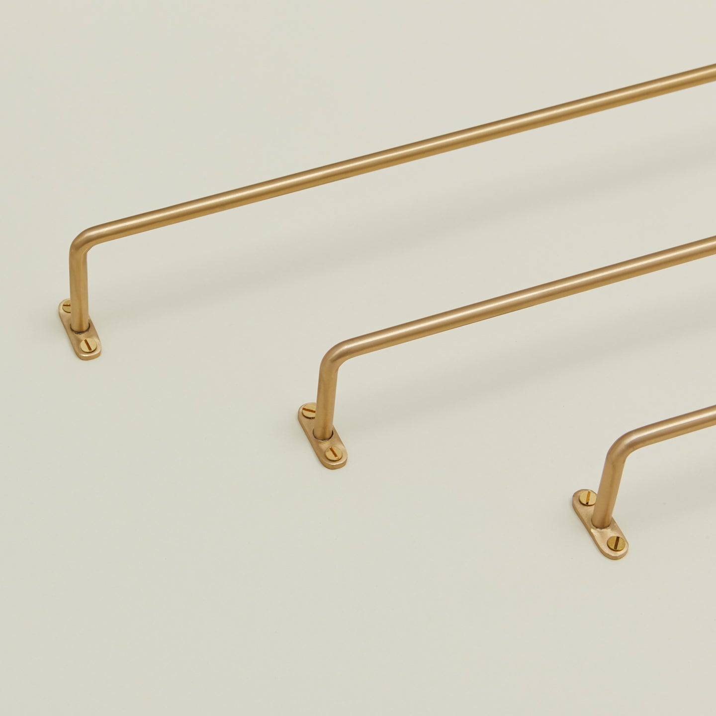 Close up view of brass towel bar family