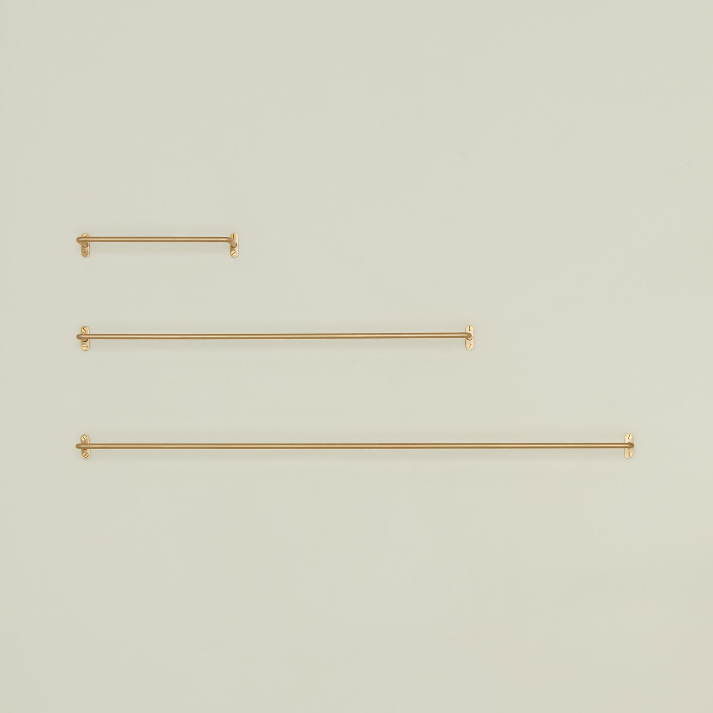 Brass towel bar family in various sizes