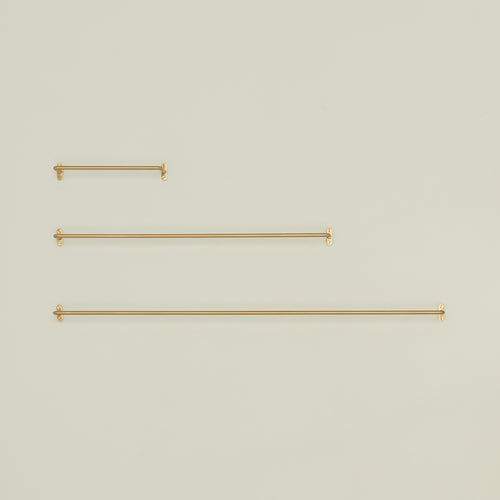 Brass towel bar family in various sizes