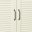 Iron handles in black on cabinet doors