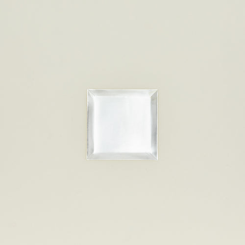 Overhead view of square silver plate