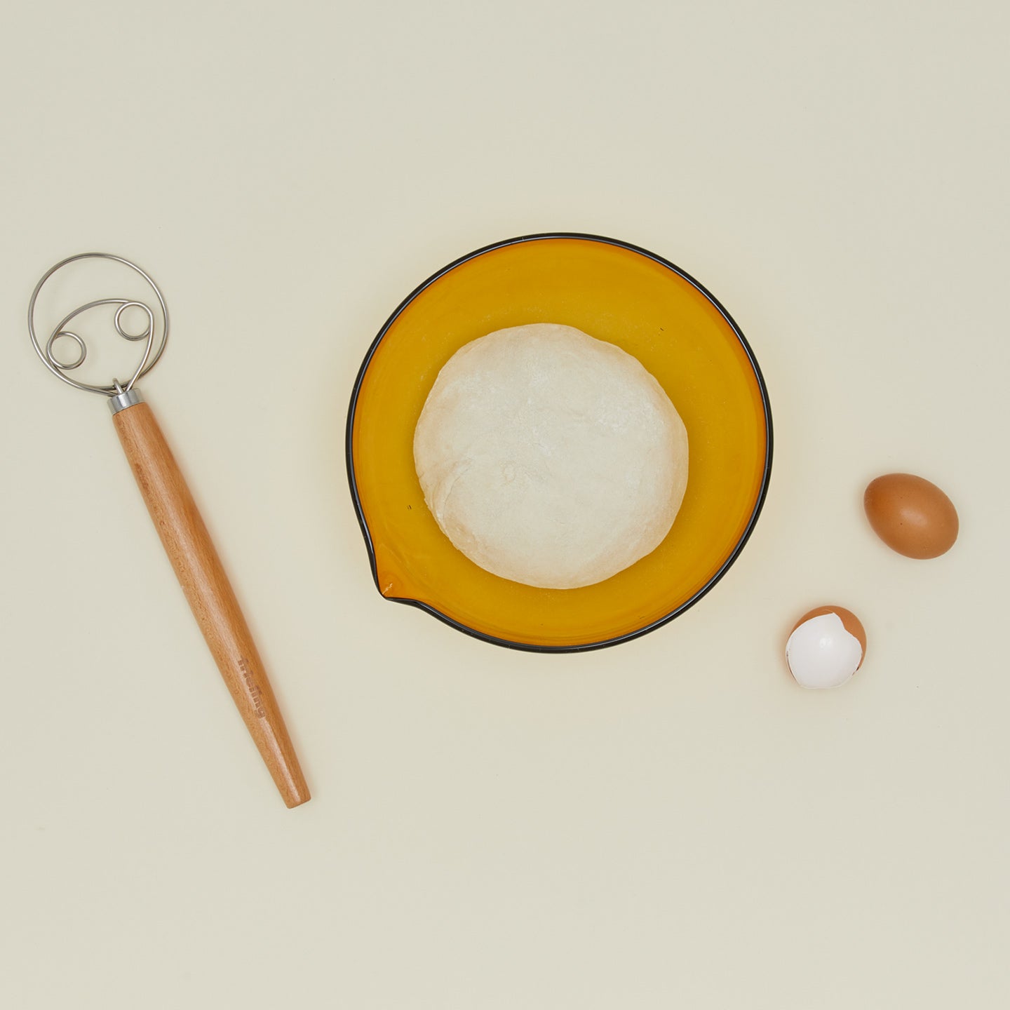 Frieling dough whisk. with mixing bowl and eggs 