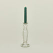 Large blown candlestick holder with candle