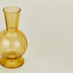 Detailed view of Small amber glass vase