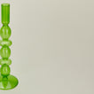 Close up view of Disk candle holder in green