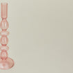 Close up view of Disk candle holder in pink