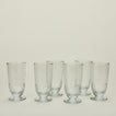 Six Artois Ice Tea glasses.