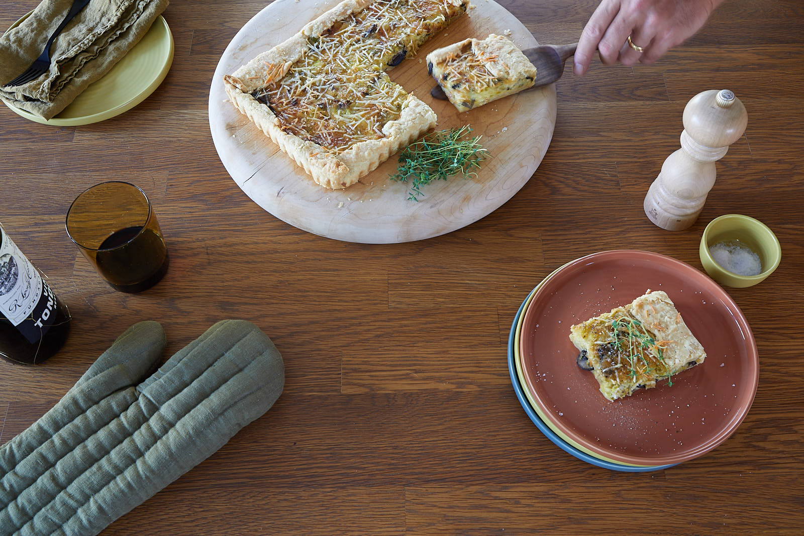 Leek and mushroom tart being served.