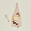 Horn cheese knife set with serving board, cheese, dates, and walnuts