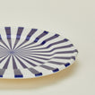 Detailed view of Maison Madison starburst dinner plate