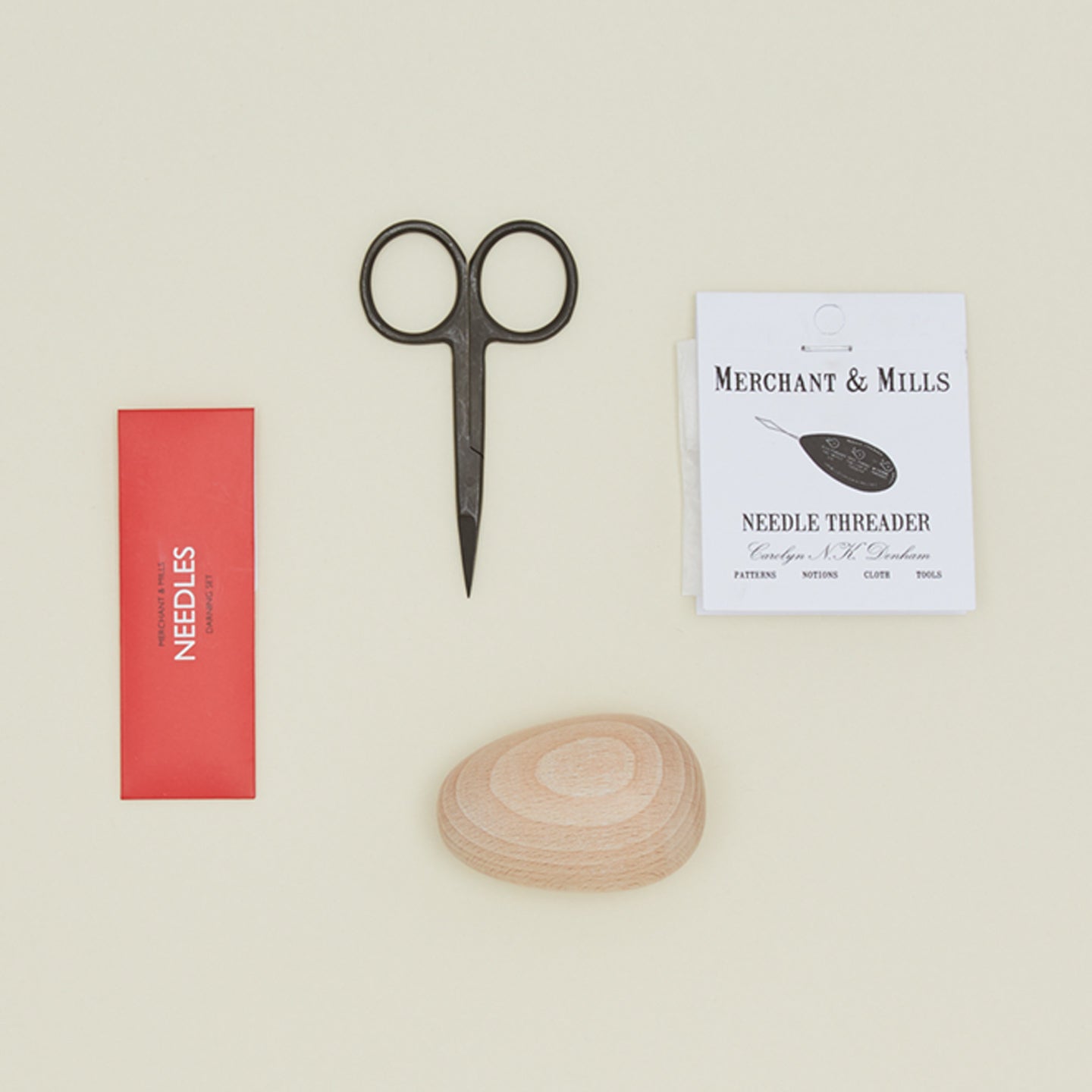 Darn set with needles, scissors, threader, and darning egg 