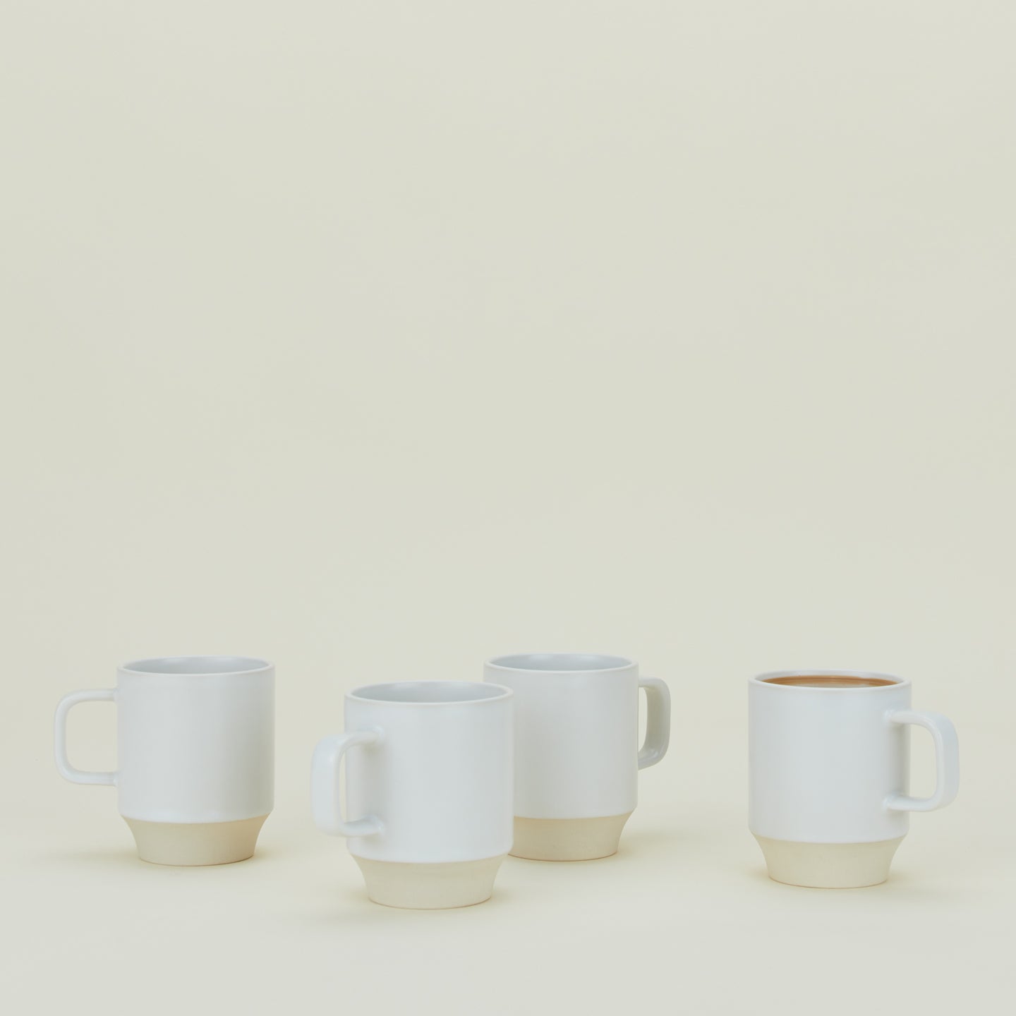 Group of four Modernist Mugs.