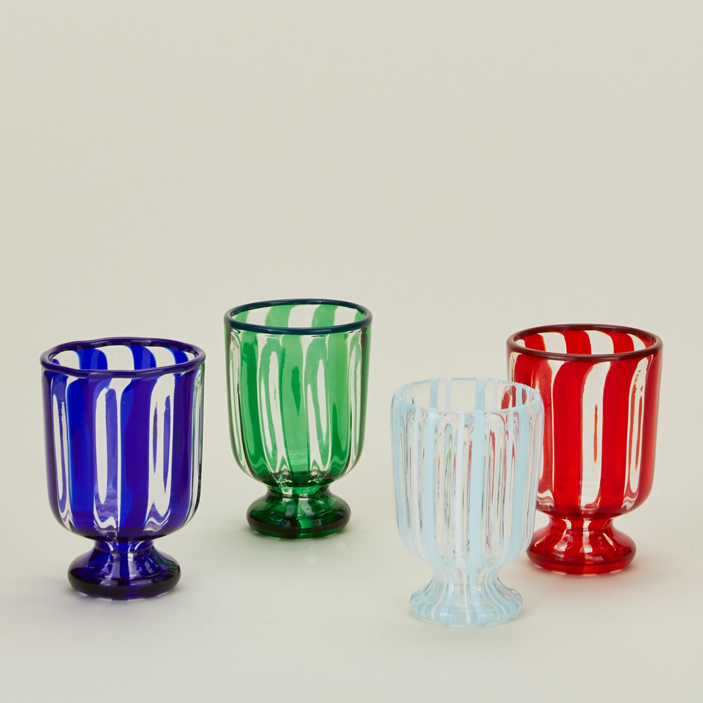 Striped wine glass family in various colors