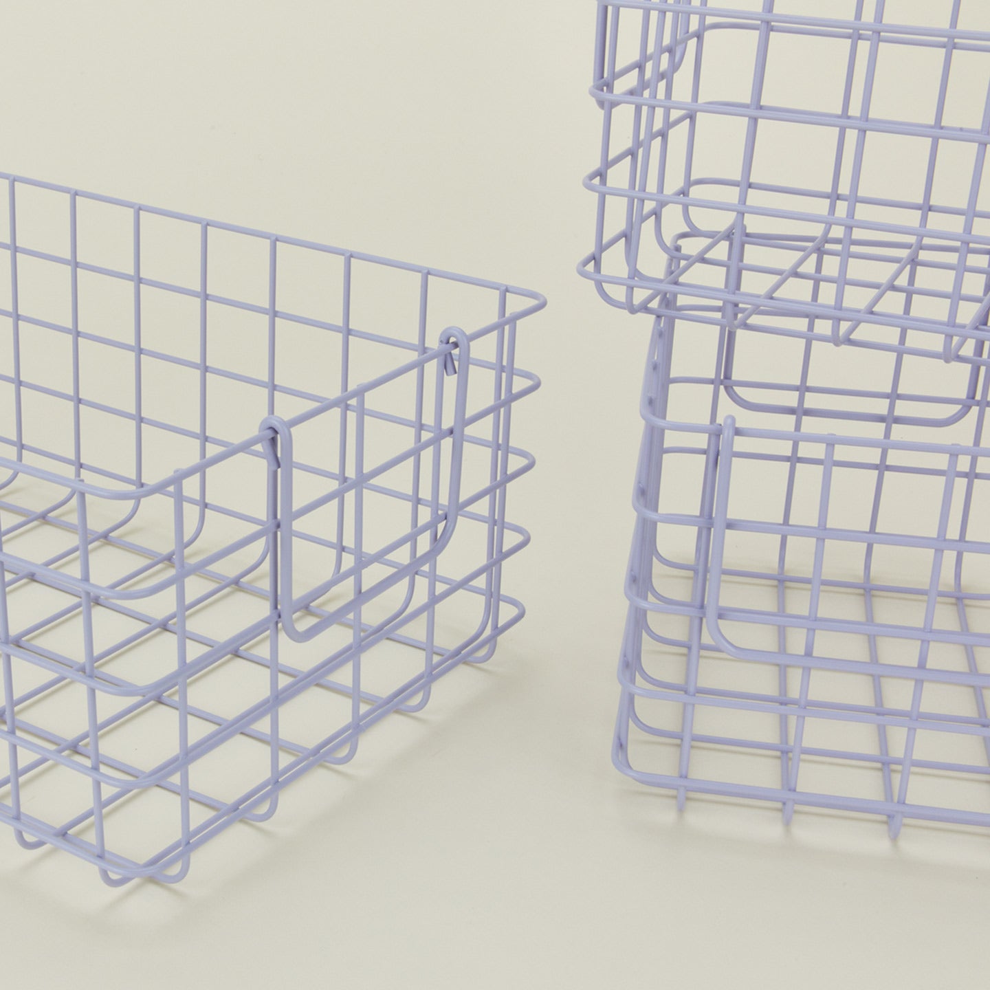 Close up view of Set of 3 grid baskets in lilac