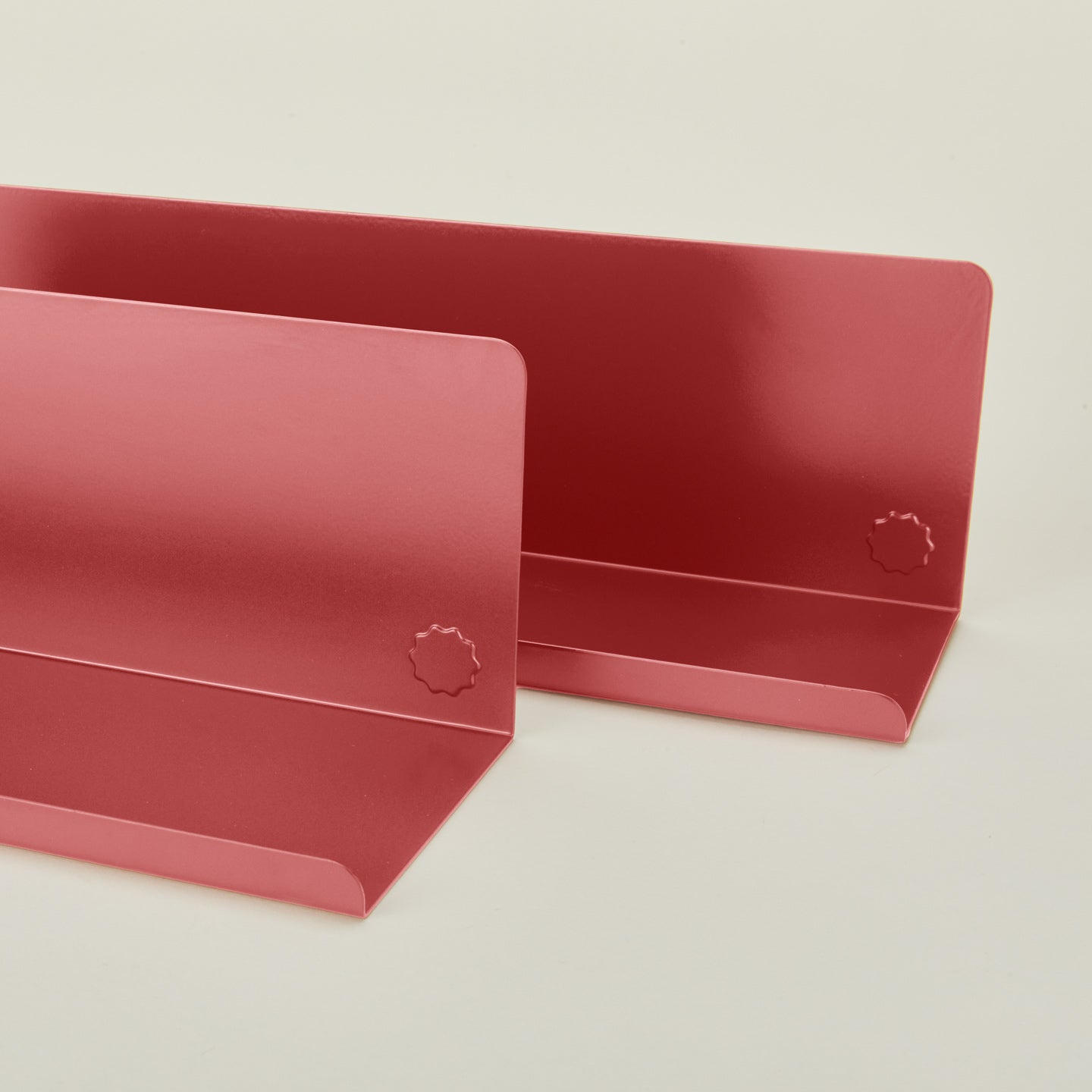 Close up view of Ledge shelves in poppy