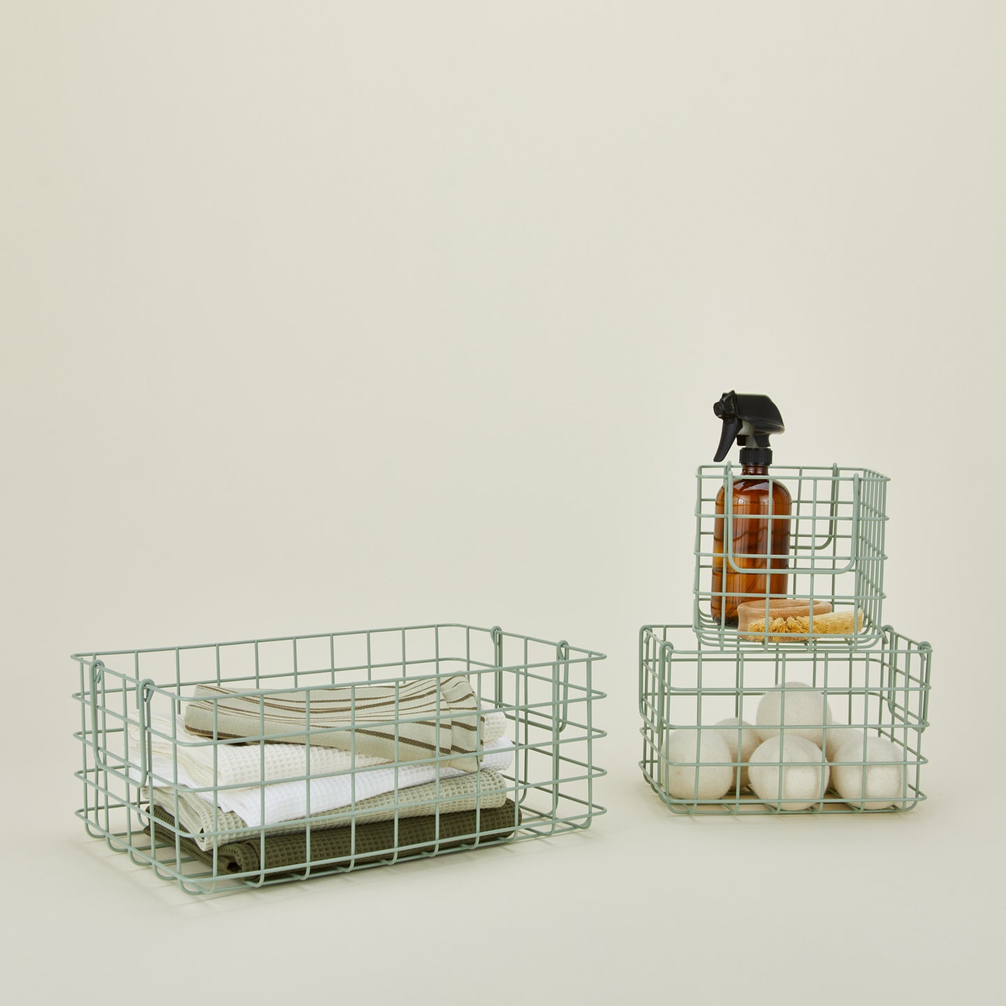Set of 3 grid baskets in sage with items