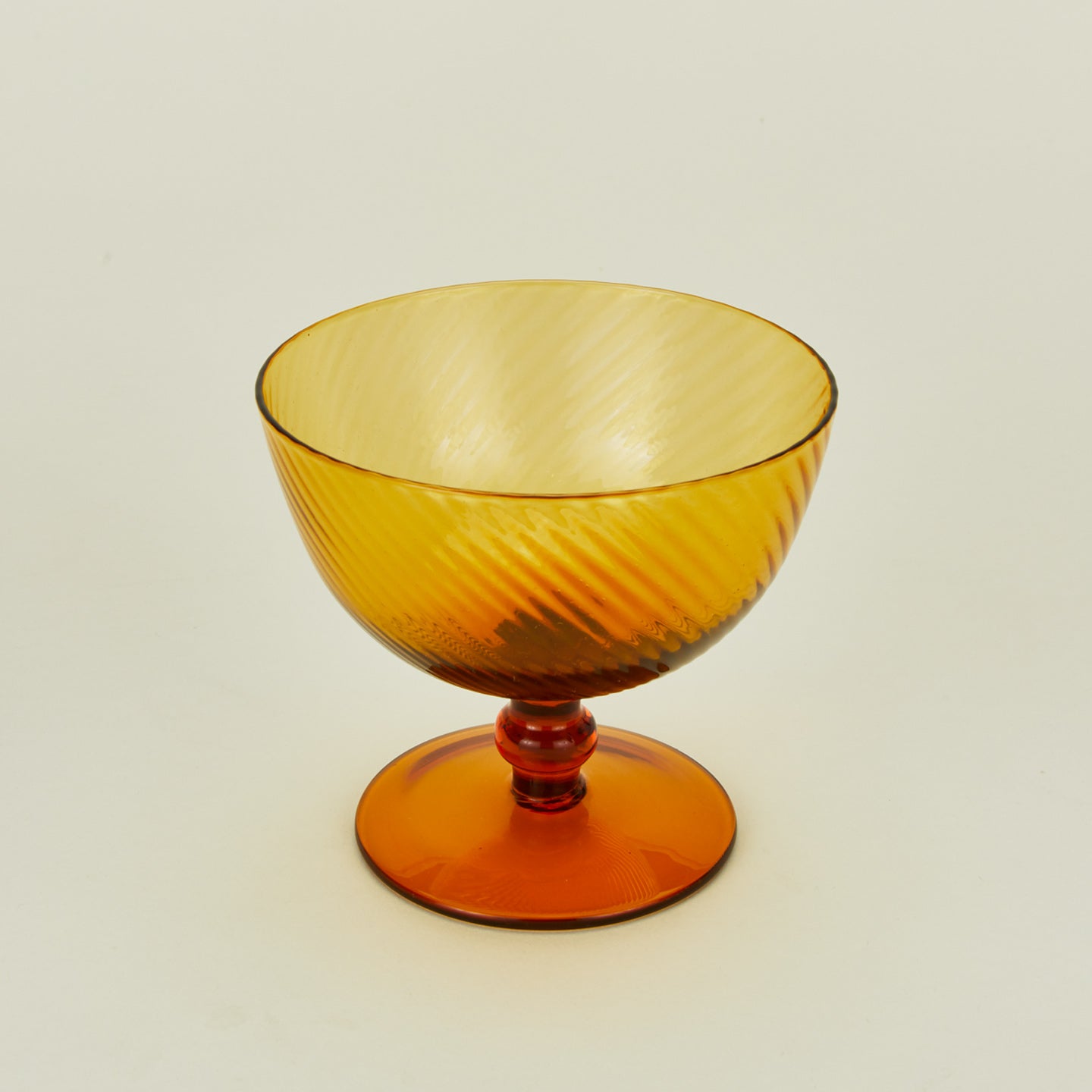 Detailed view of optic coupe in amber