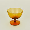 Detailed view of optic coupe in amber