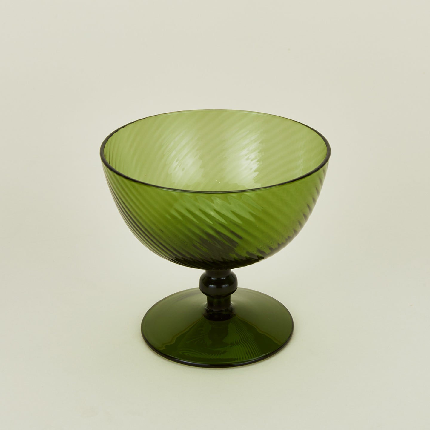 Detailed view of optic goblet in olive