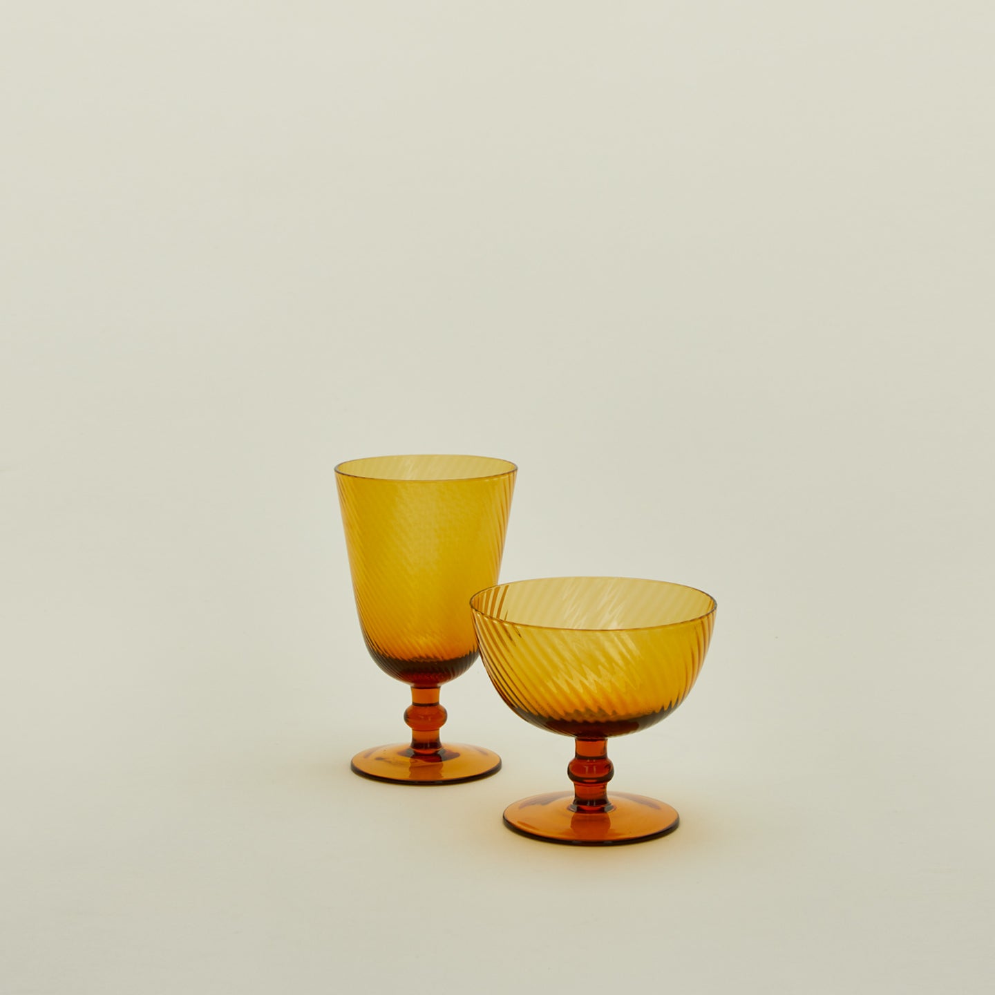 Optic goblet and coupe in amber