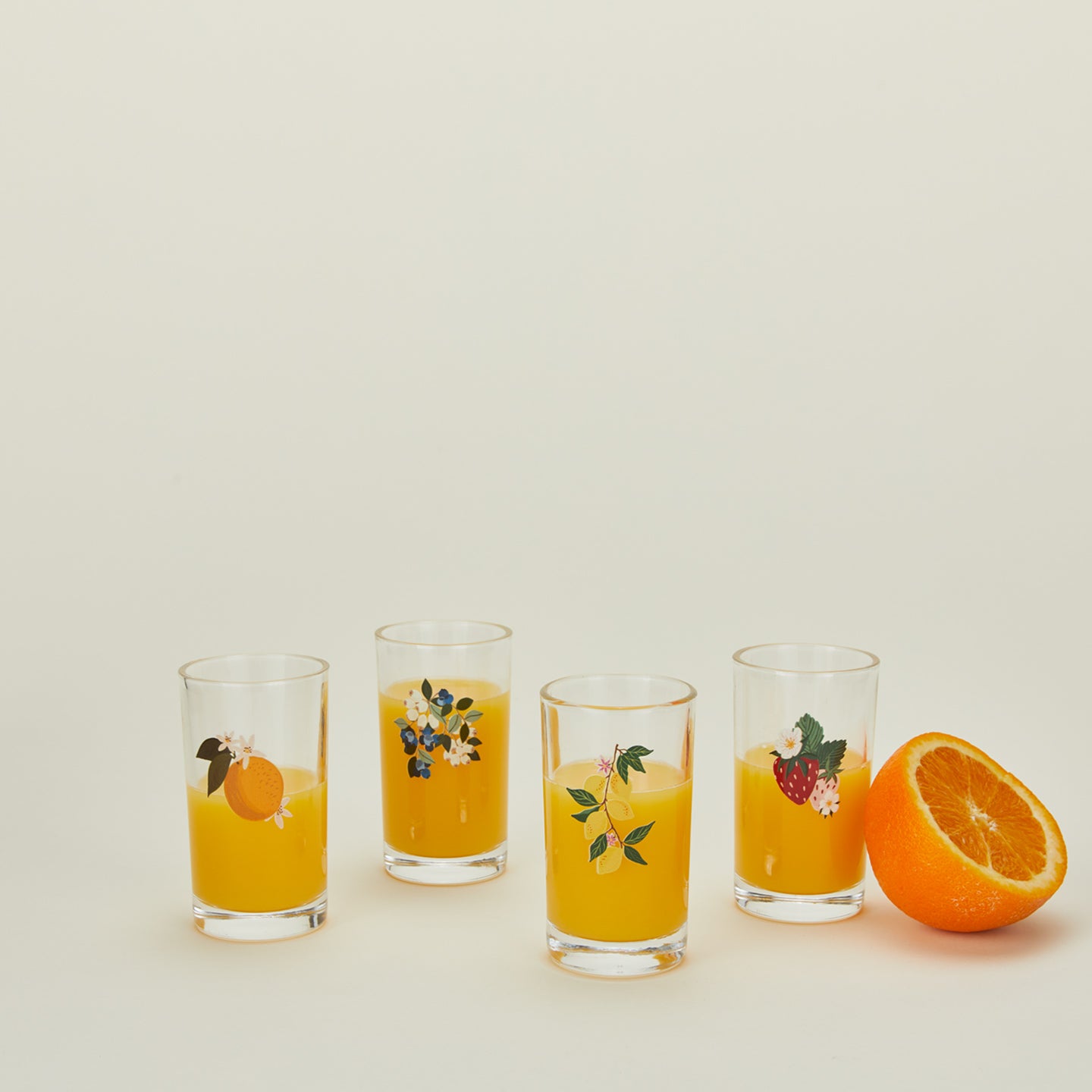 Juice glasses, set of 4 with juice and orange