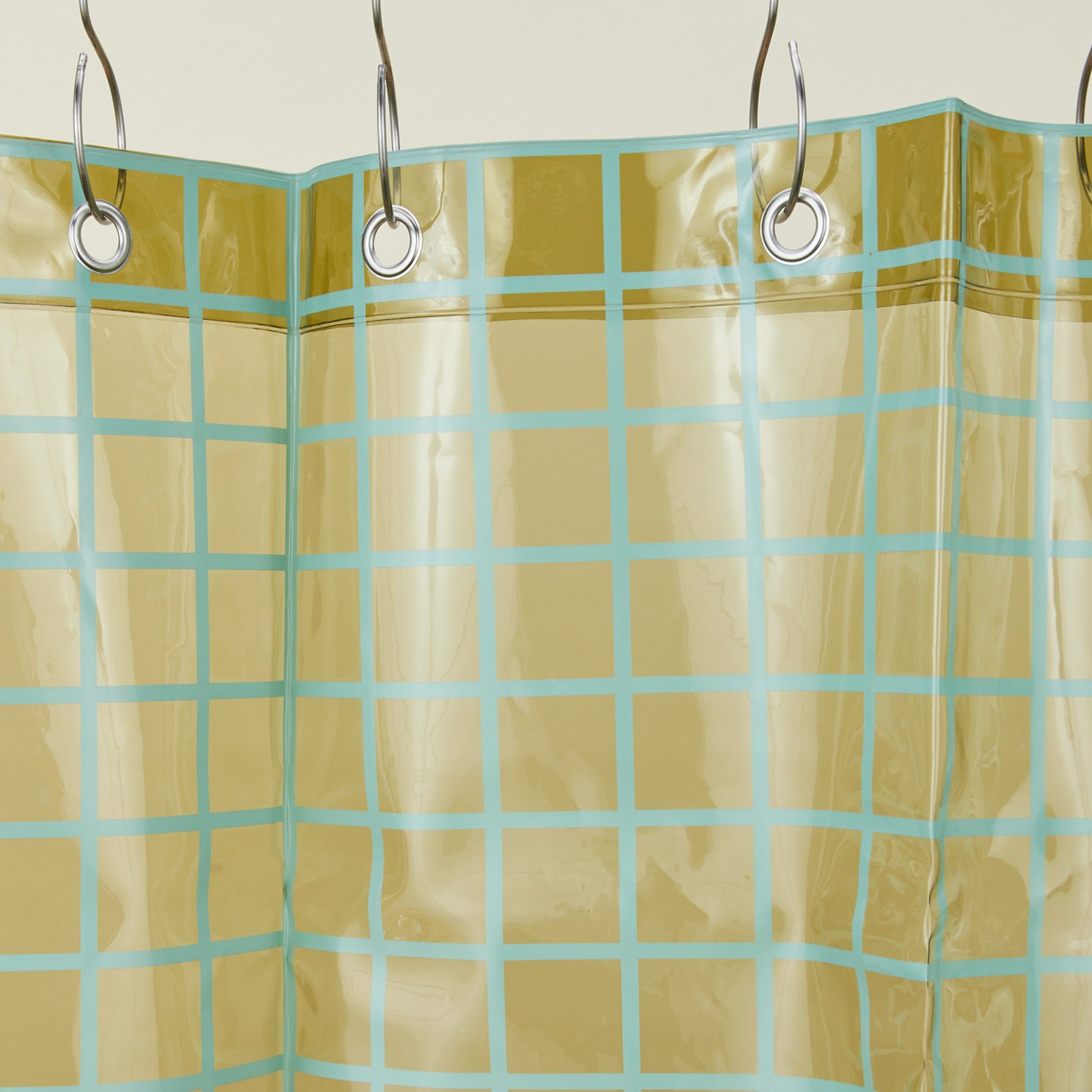 Sun grid shower curtain in olive