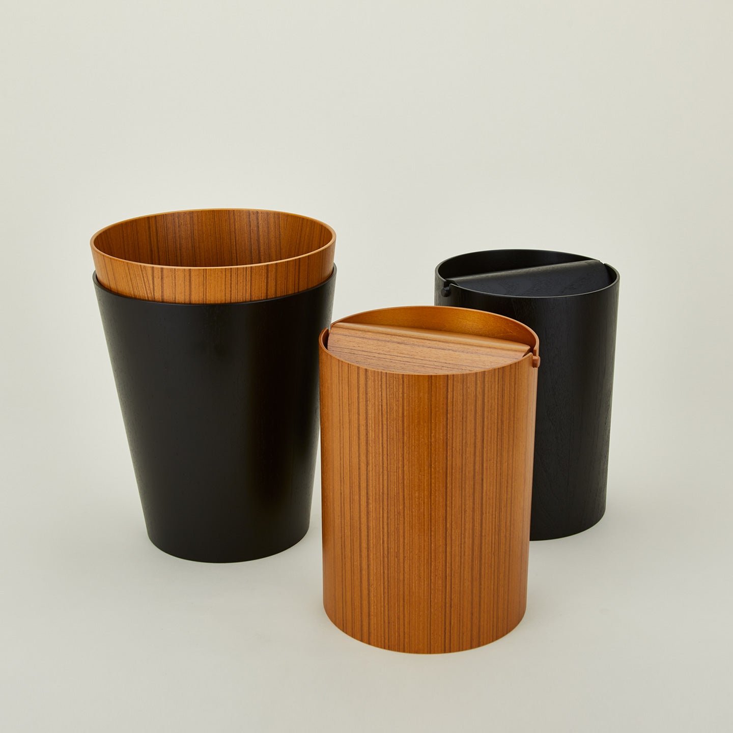 Wooden waste baskets in various colors
